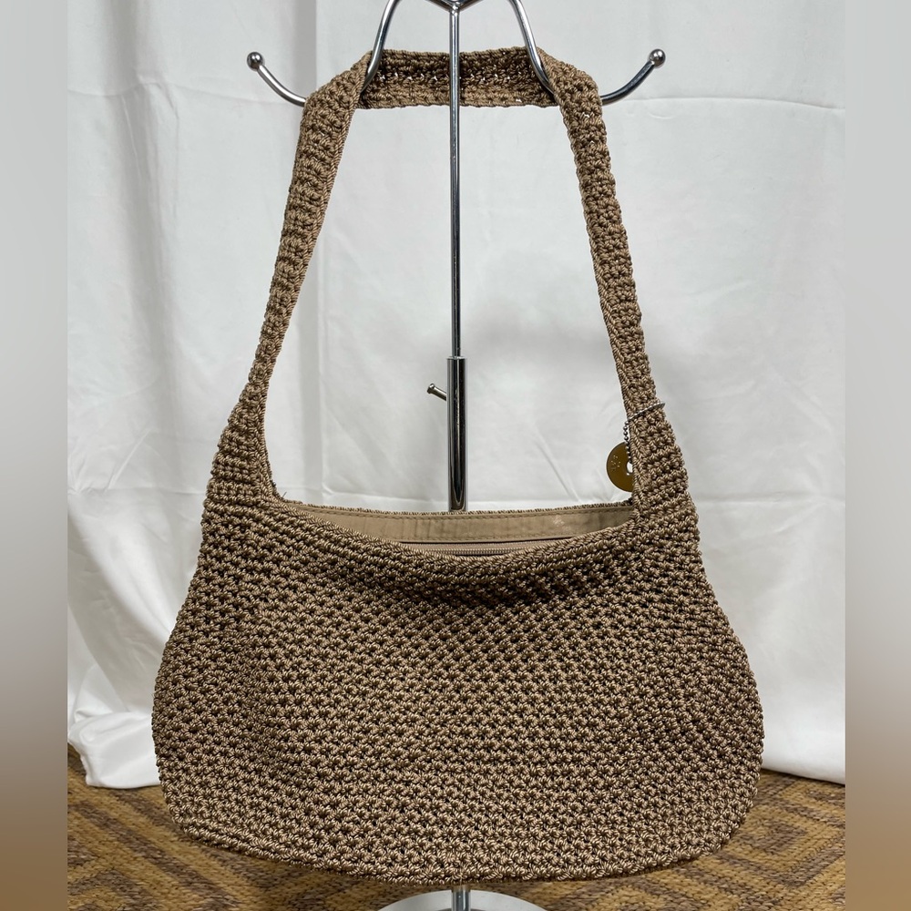 The Sak Tan Crochet Woven Shoulder Bag.